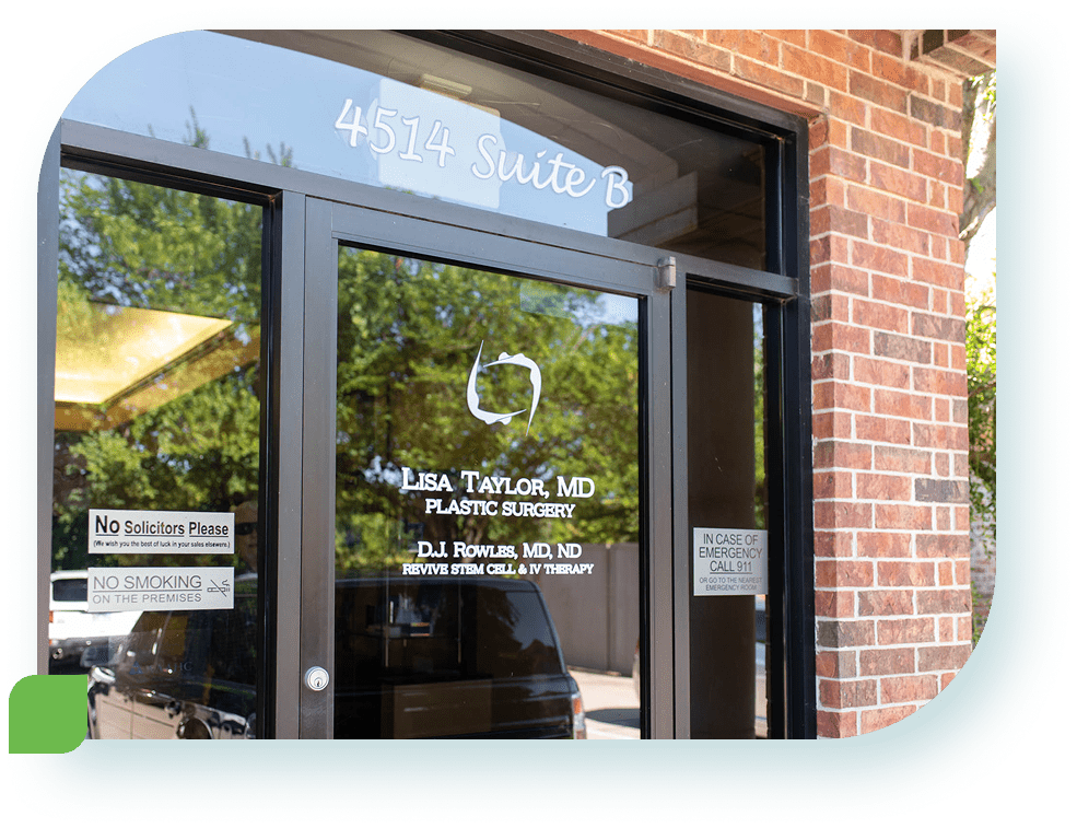 Plastic surgery clinic entrance with signage.