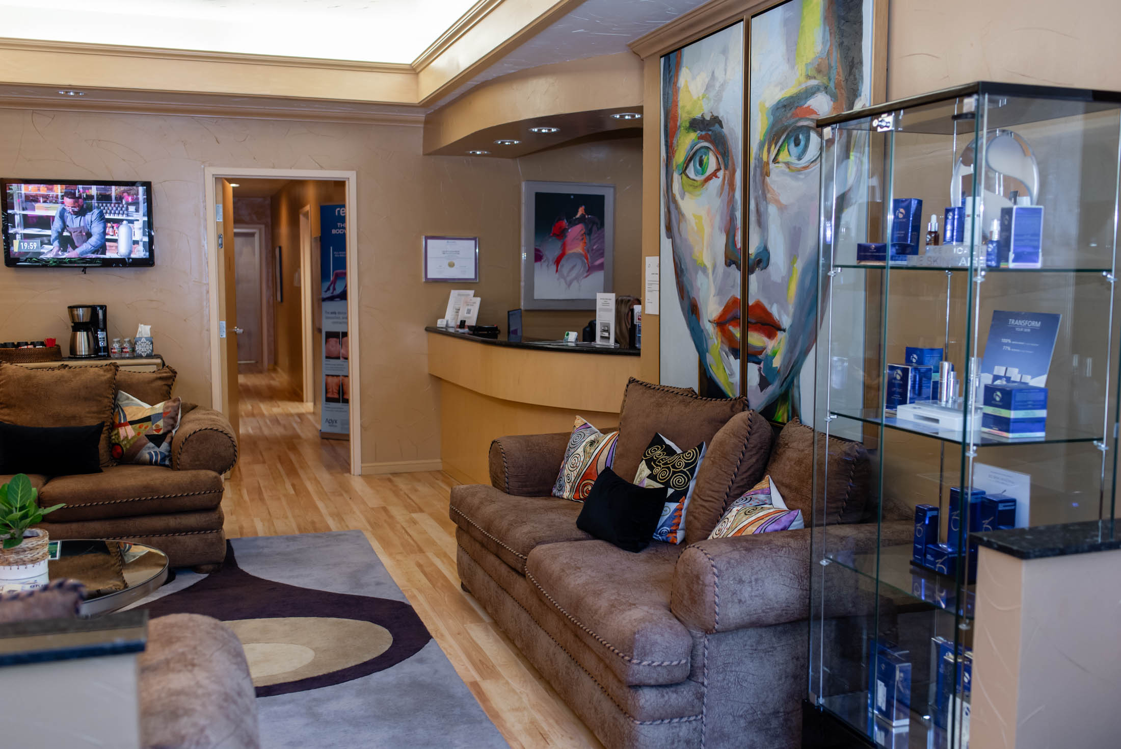 Modern waiting room with colorful wall art.