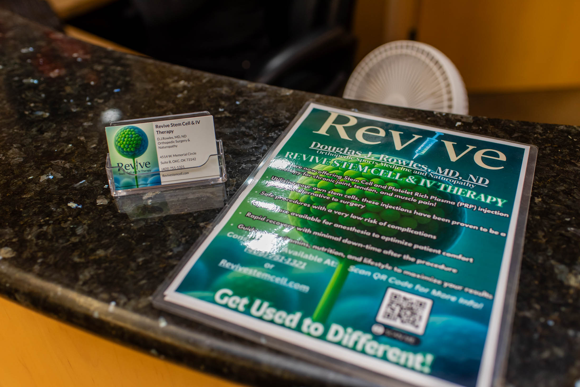 Revive brochure and business card on counter.